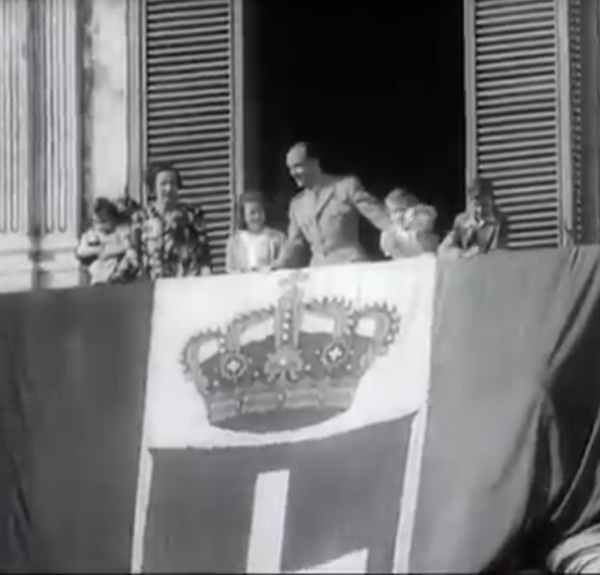 King Umberto II behind of the Flag of Kingdom of Italy